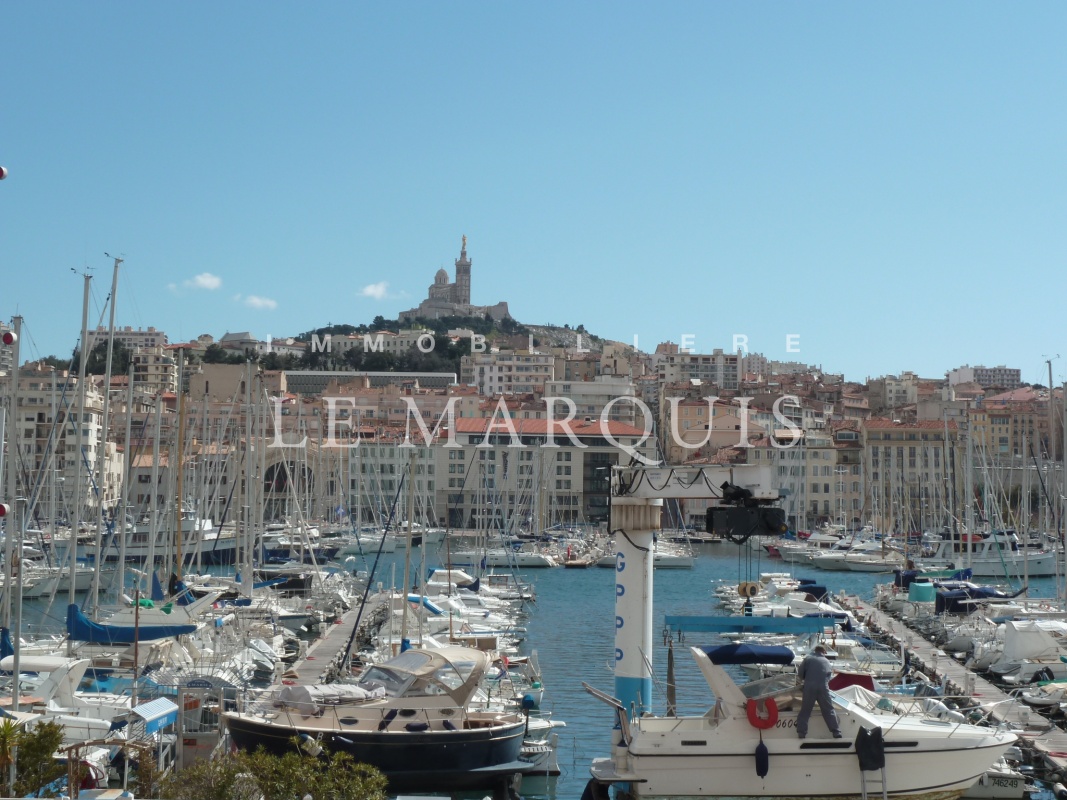 Vue imprenable du séjour sur le Vieux Port 